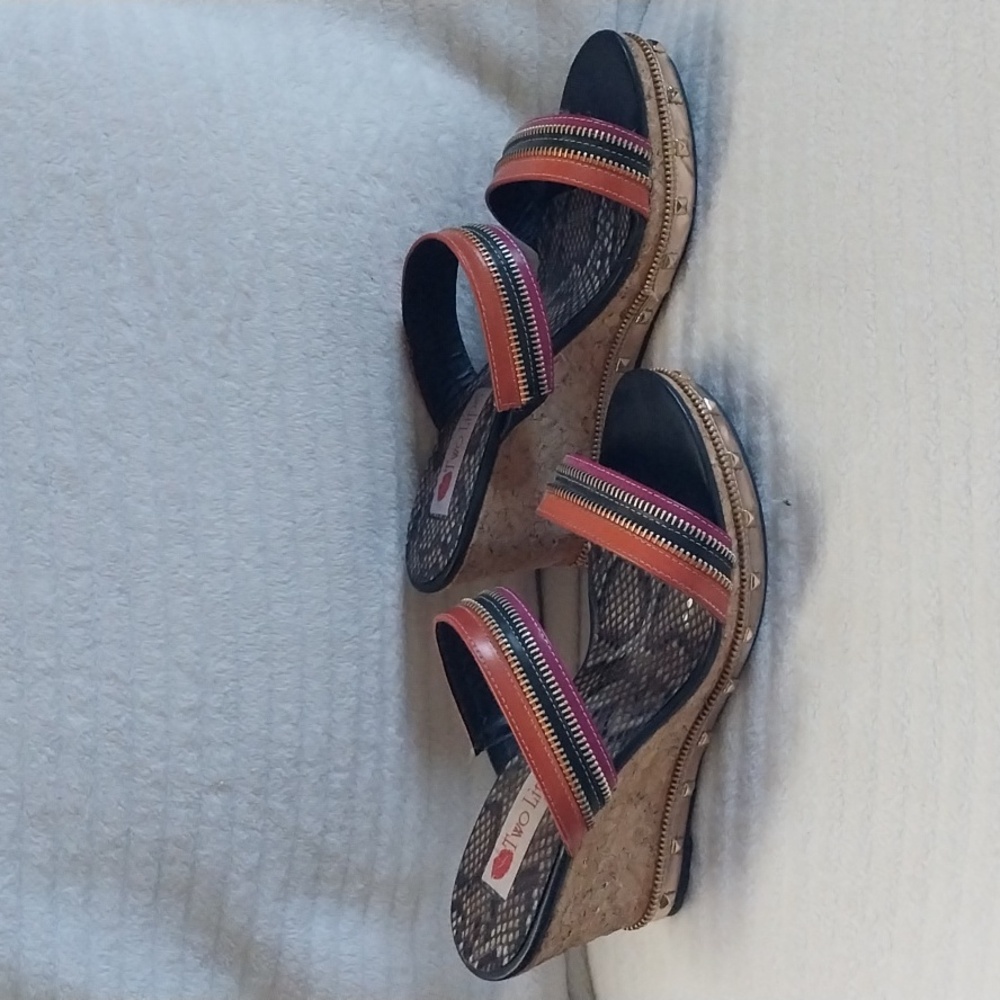 Two lips multi color sandal in a size 8 with a 3.5in wedge heel, gently worn